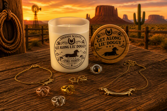 Lit Get Along Lil' Doggy soy candle with Fri-Toes corn chip scent label, shown with dachshund rings, necklace and bracelet