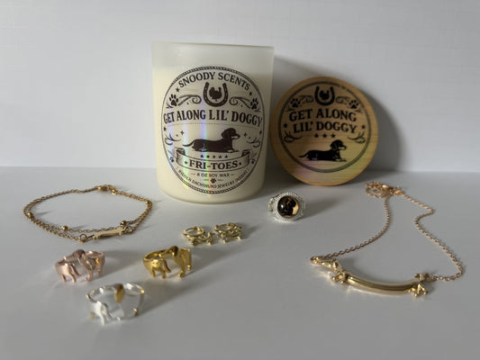 Get Along Lil' Doggy dachshund jewelry candle with the real gold dachshund pendant, rings and earrings that ship inside it